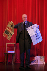 ian keable tearing a newspaper